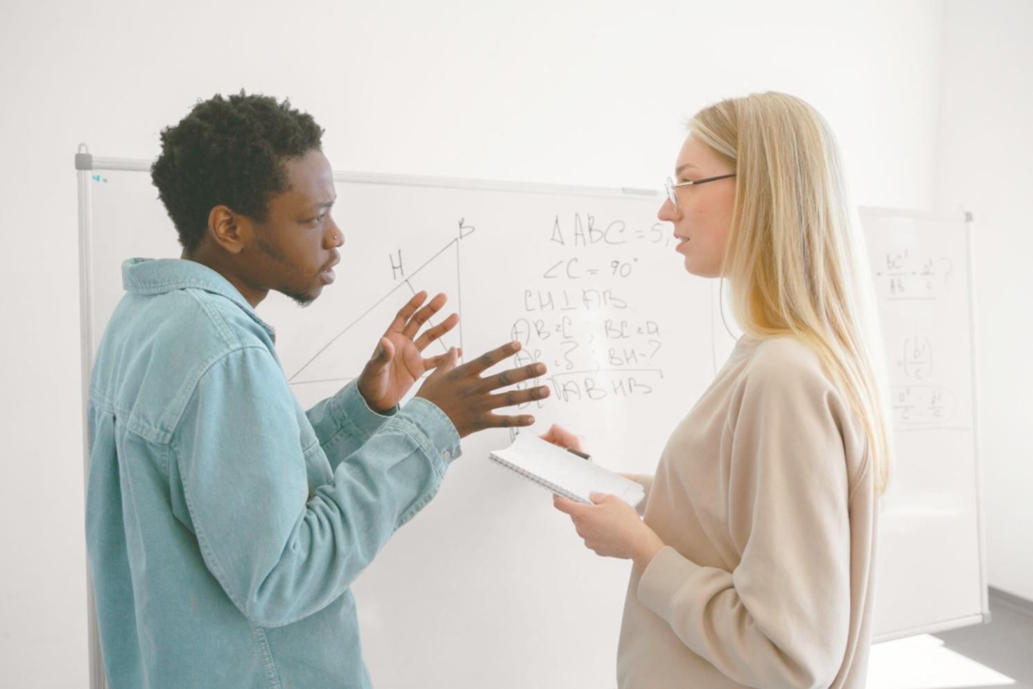 Community members collaborating during financial workshop at eldravoriq learning space